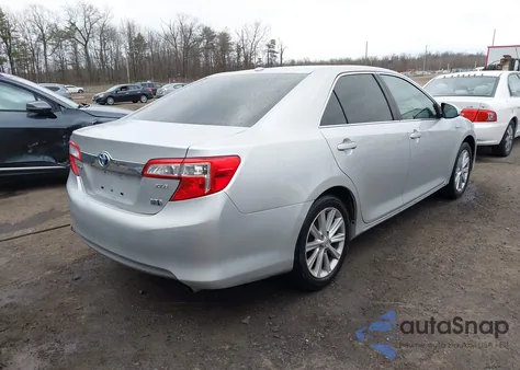 2014 Toyota Camry Hybrid Xle z USA, uszkodzony, nr VIN 4T1BD1FK9EU119558